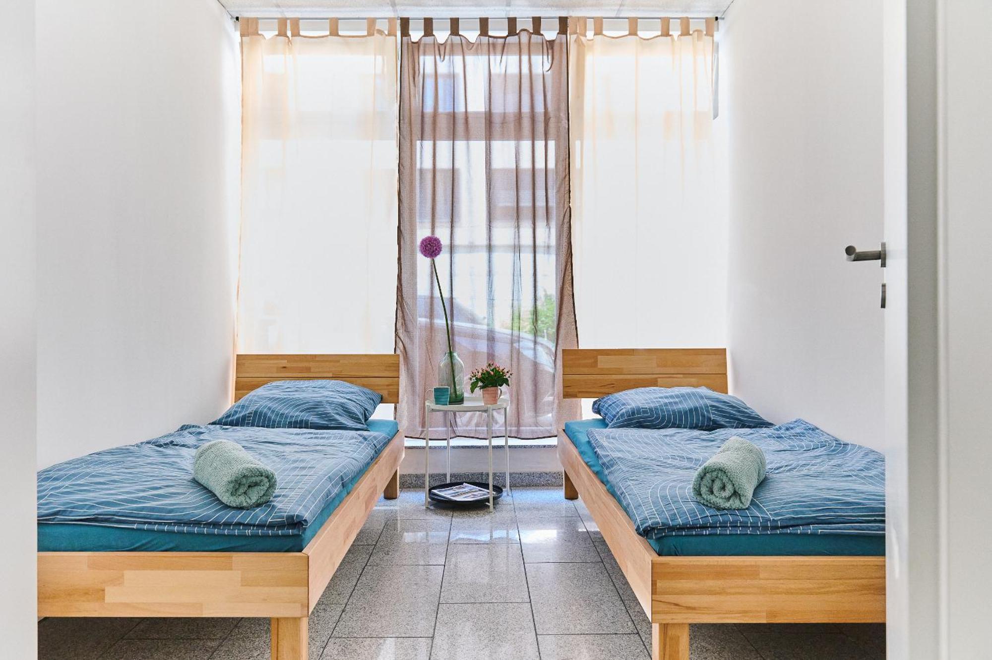 Zweibettzimmer mit Gemeinschaftsbad